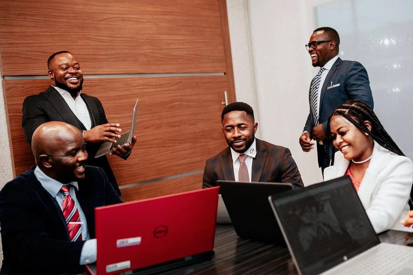 A specialist and colleagues reviewing a client case together