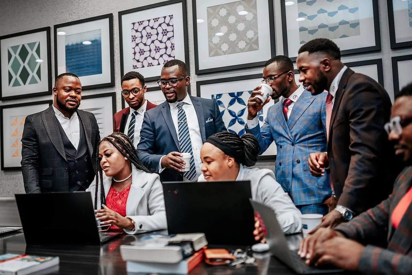 The Uptech Consulting team collaborating in the office