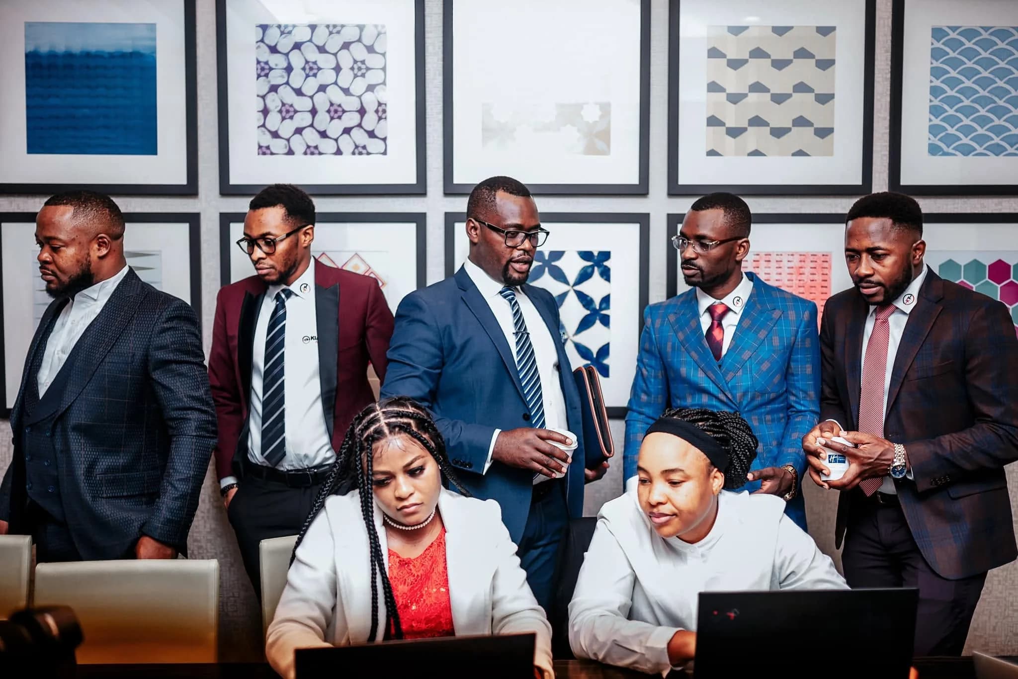 The Uptech Consulting team reviewing a client engagement together